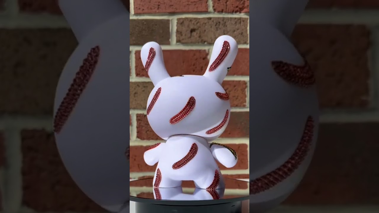 Showcasing The Crystal Andy Warhol Banana Print Dunny. Crystals by Swarovski at IamRetro.com