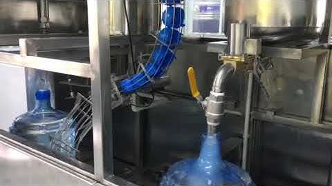 Dây chuyền tráng rửa chiết rót bình 5G tự động