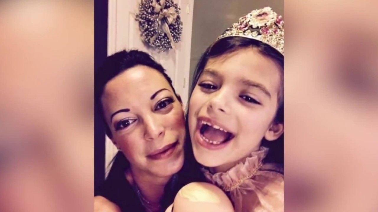 Medical examiner says woman was murdered before house was set on fire