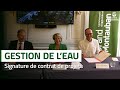 Signature dun contrat entre le grand montauban et lagence de leau adourgaronne