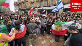 Glasgow Demonstrators Wave Flags And Dance To Celebrate U.S.-Israeli Strikes On Iran