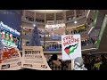 Banners at mall of america call for boycotts of israeli apartheid supporters on black friday