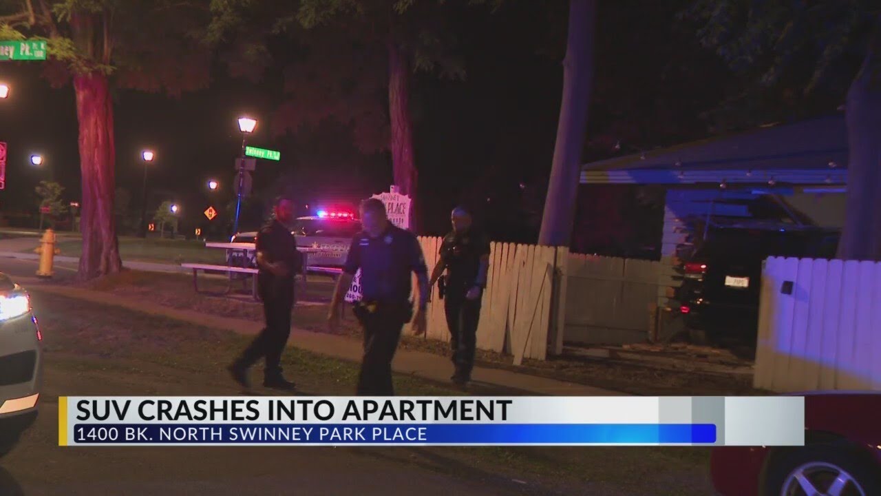 SUV crashes into apartment - YouTube