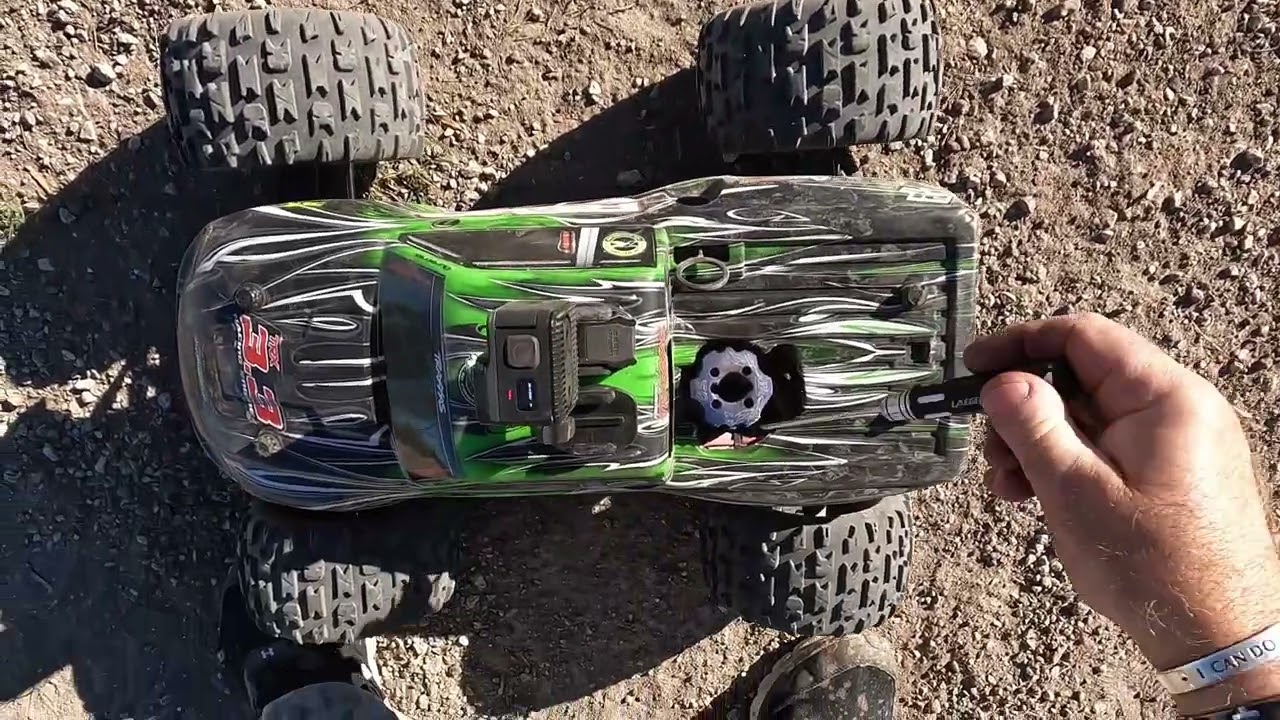TRAXXAS Revo 3.3  with O.S. 21 engine tearing up the farm.