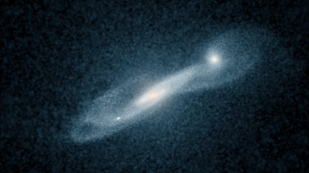 Simulation of minor galaxy merger - YouTube