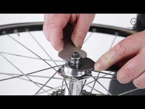 Video: How To Adjust The Rear Bike Hub