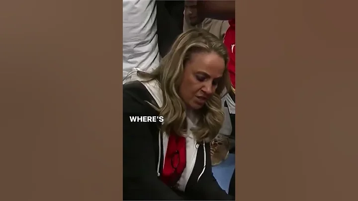 Becky Hammon in the team huddle at the game agains...