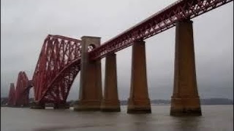 Winter Train Crossing Forth Railway Bridge On History Visit To South Queensferry Scotland