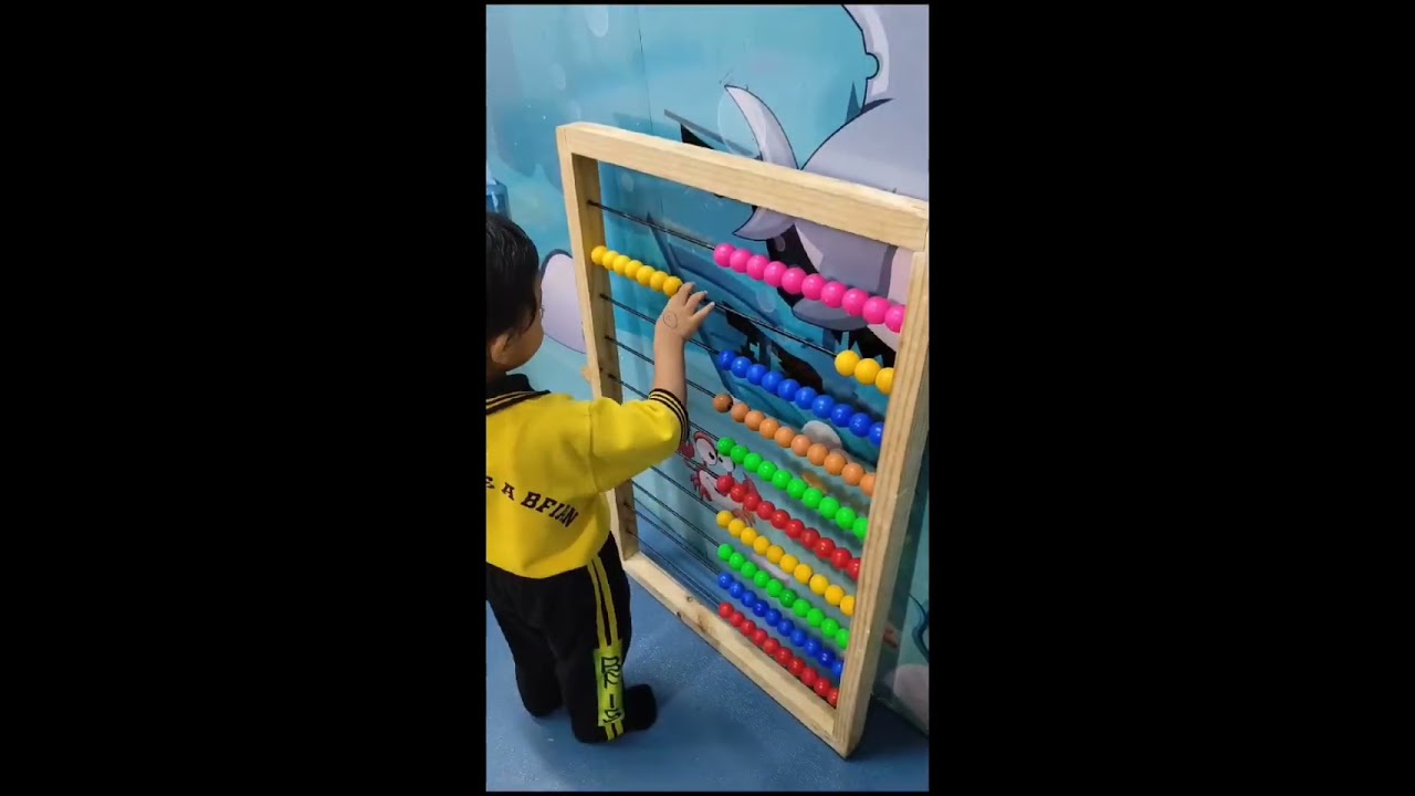 Fun with beads , pom pom balls and abacus 