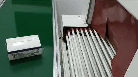 machine video of the face mask shrink packing