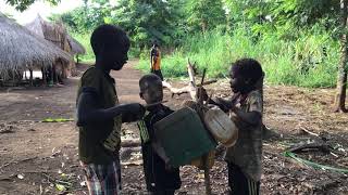 Drumming on jerry cans in Gok - Gambella Ethiopia