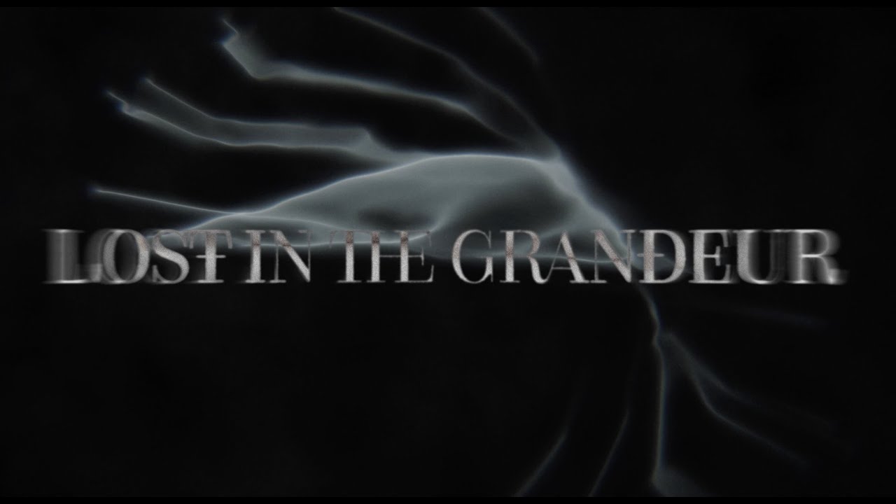 Korn - Lost In The Grandeur (Official Audio) - YouTube