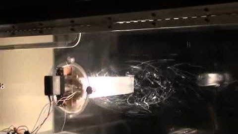 Tall building Vortex shedding with Dynamical Geometry and Helium Bubble Tracing System