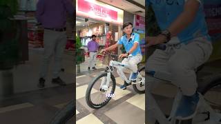 Riding Cycle In The Mall