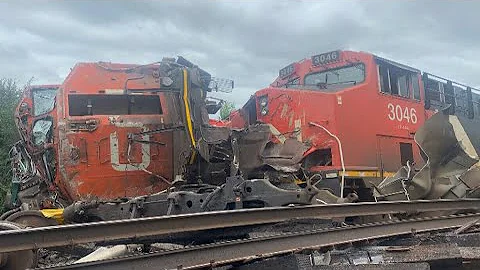 Massive head-on collision between freight trains i...