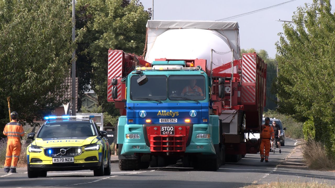706 tonne vehicle escorted by police through tiny old English village