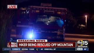 Hiker being rescued off mountain
