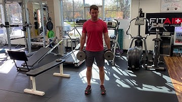 Suitcase Squats with Dumbbells