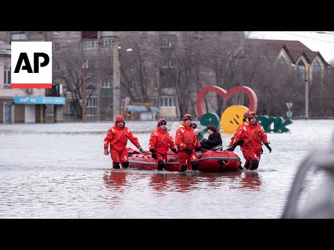 Emergency services in Russia evacuate people from flooded Orsk city