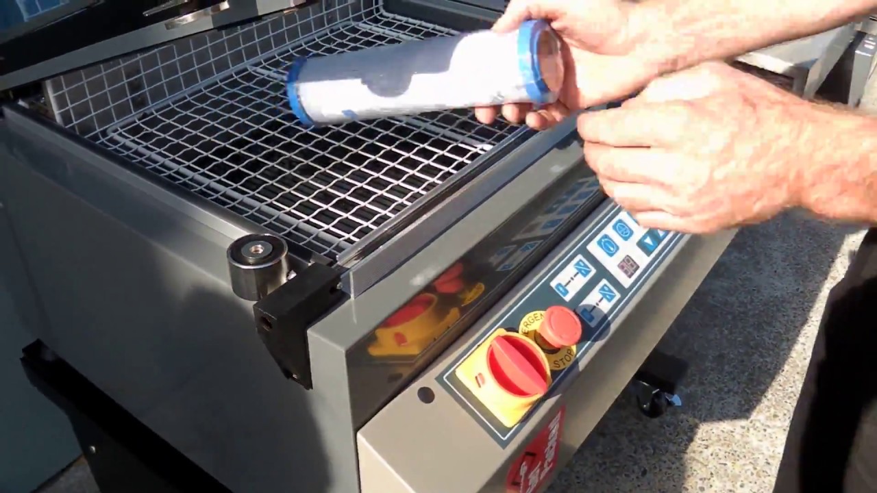 Shrink wrapping filters on a SeleCTech 455 Shrink Wrapper One Step ...