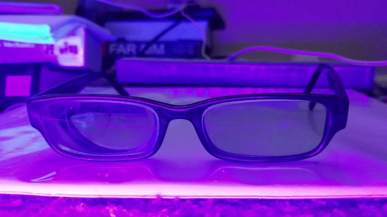 Shining a near UV light on a Photochromic lens YouTube