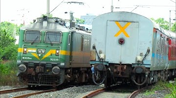 Fully Loaded Freight Train Overtaking The Sealdah Rajdhani Express on Full Speed.