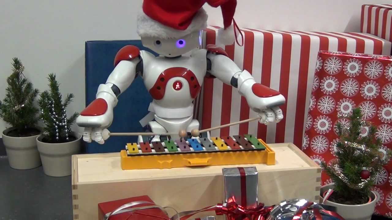 NAO humanoid robot plays Jingle Bells on a glockenspiel. Merry