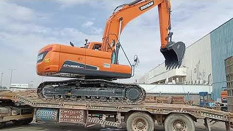 Experienced Excavator Operator Loading And Unloading Excavator
