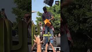 Travis Scott Shocked by Fan Gift, Then Signs His Shoes On Stage! #shorts