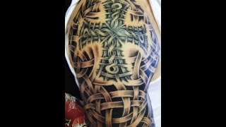 shoulder cross tattoo