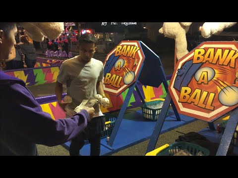 Carnival Game: How The game Bank A Ball scammed my friend! Watch his hands.