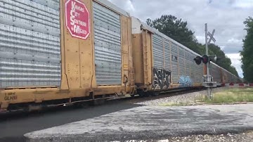 CSX 835 w/ strange K5HL flies through McDowell jct on 5-7-22 at 2:15 pm