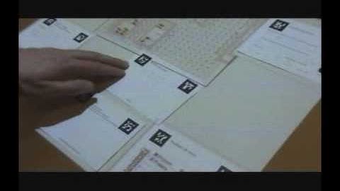 TinkerSheets: paper-based interface to control and visualize tangible simulations