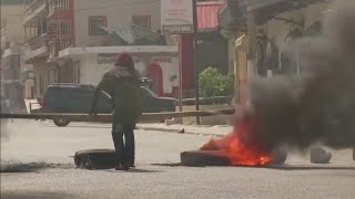 Outside of assassinated Haiti president's funeral plenty of unrest