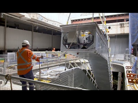 Video: Metro ringan di pinggiran kota. Konstruksi rel ringan