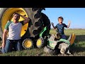 We ran over our tractor | Using real tractors on the farm | Tractors for kids