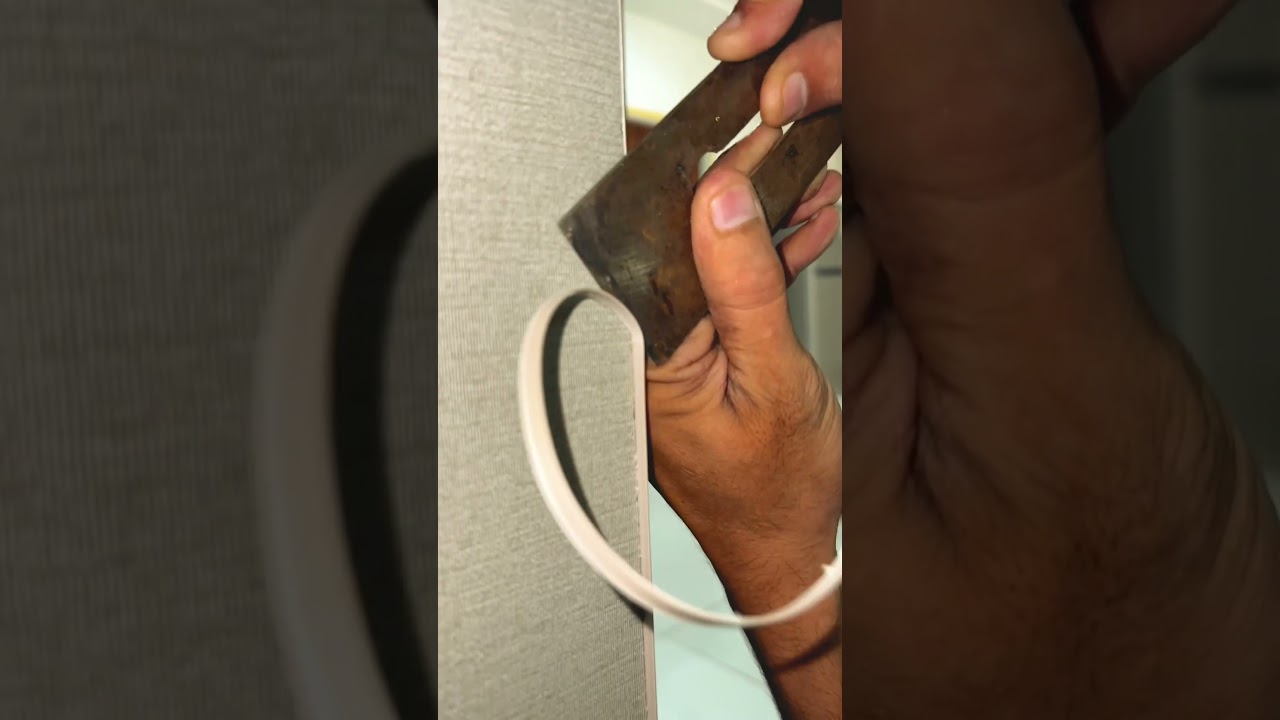 “Woodworking Perfection: Satisfying Chisel Cut on Edge Tape.” 