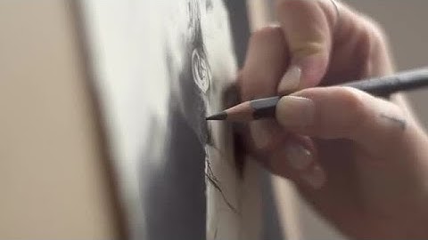 Artist Draws Picture Of A Man Stock Video