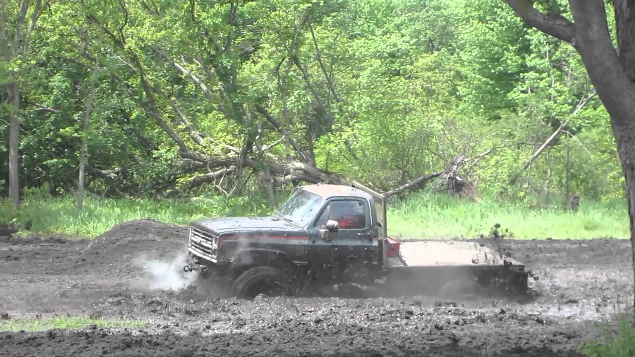 Green Pickup Truck Goes Swimming At Perkins Mud Bog