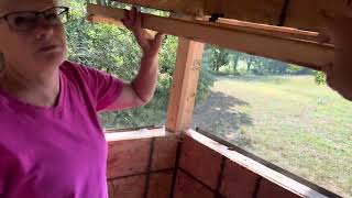 Deer blind plexiglass window