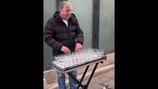 This guy plays Harry potter music using only glass cups screenshot 5