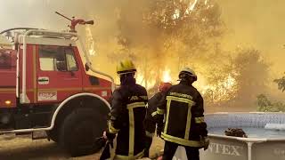 Spain, France race to control wildfires as tens of thousands flee