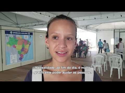 Teresa Souquet, colaboradora do CICV no Brasil: Migrantes se comunicam com familiares - Teresa Souquet, colaboradora do CICV no Brasil: Migrantes se comunicam com familiares