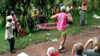 Michael Ellis hula hooping with the Batwa People Uganda