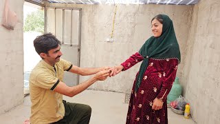 Shahin proposes to Leila and gives her a ring for marriage.