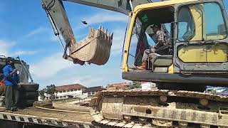 Fuso Self Loader Truck Loading Volvo EC210B Excavator 