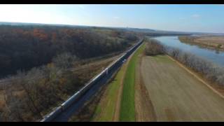 Congo, MO BNSF Chasing an autorack train at low levels 70mph HD Drone Video