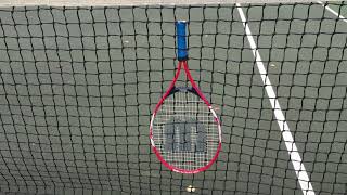 I Hung My Tennis Racket Onto The Net Of A Tennis Court