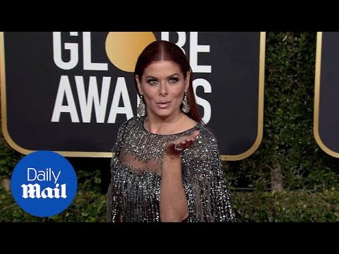 debra messing golden globes 2019 dress is fancy in feathers at the Tissue Jari Shirt