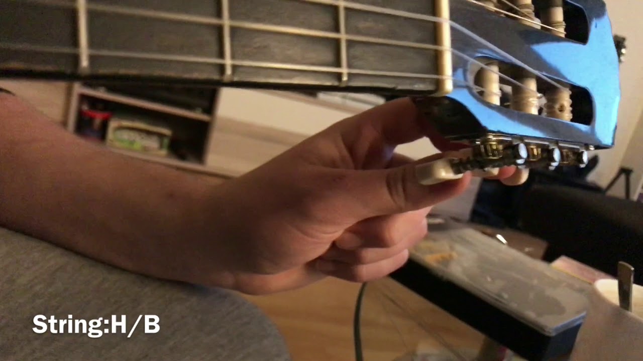 How to tune an acoustic guitar with Apple iPhone guitars tuning DIY